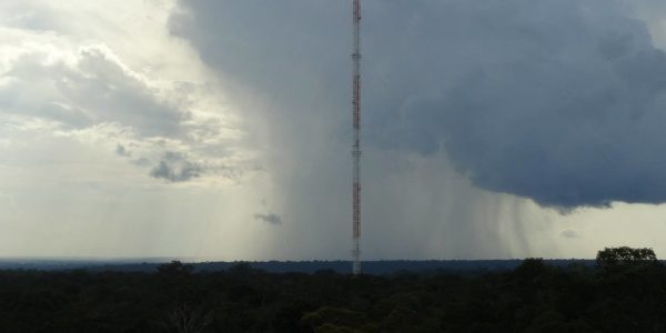 rain behind tall tower